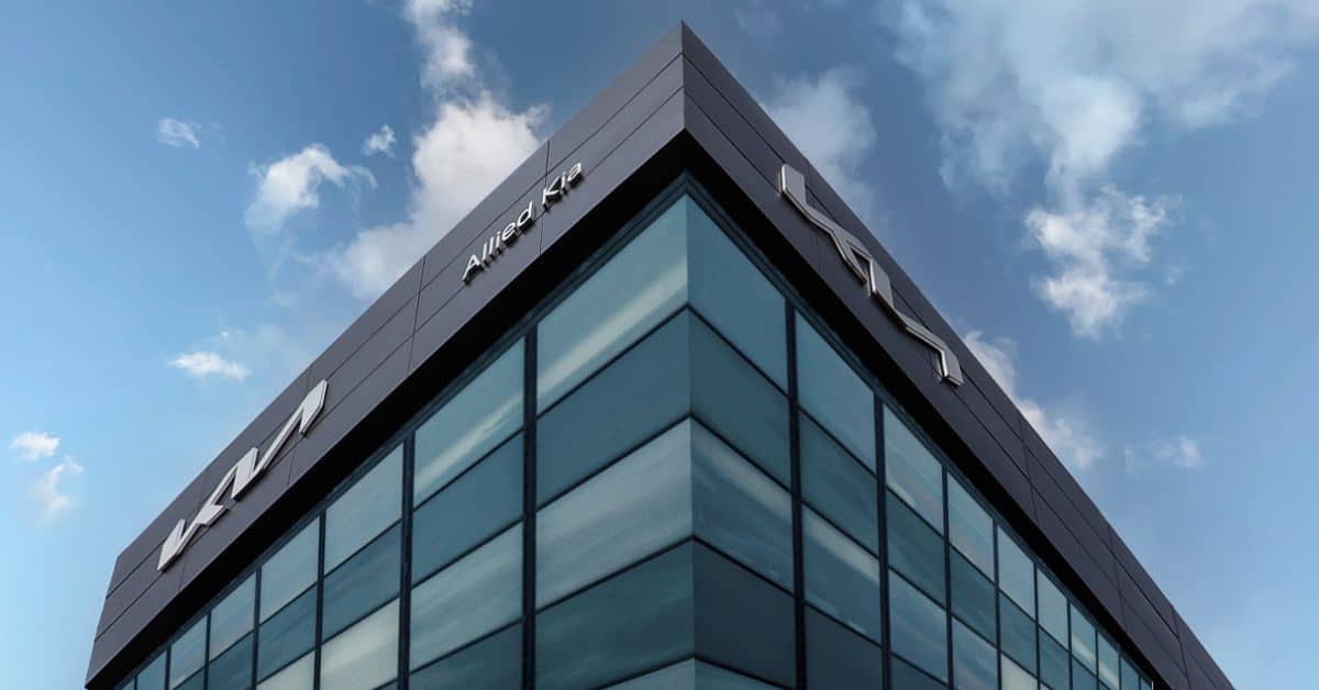 Kia dealership building with glass façade and ACP cladding