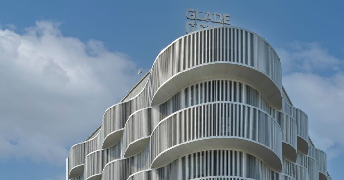 Curved ACP façade of the GLADE Spectrum designed by UNEVEN Architects