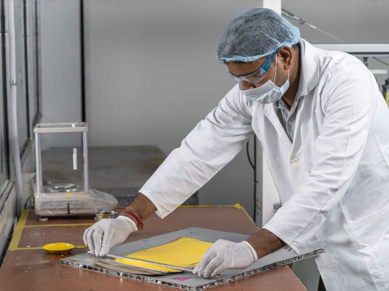 Hand Application of Paint in Tinting Lab