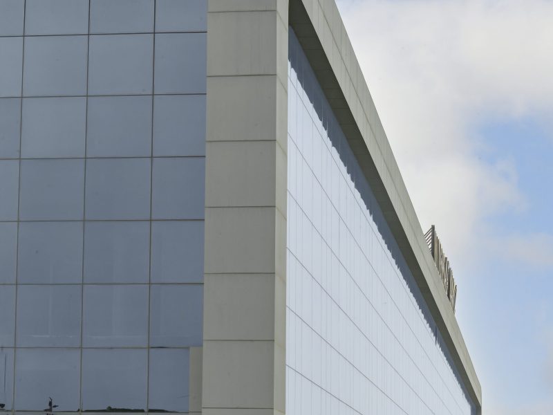 Universal Quartzs - Modern Industrial Building with Sleek ACP Façade Design